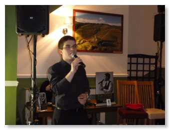 Tom Wyllie singing at La Torre Bedlington