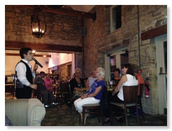 Tom Wyllie singing at The Old Storehouse